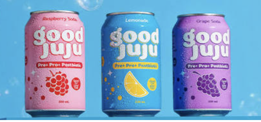 Three good juju drink cans: raspberry, lemonade, and grape